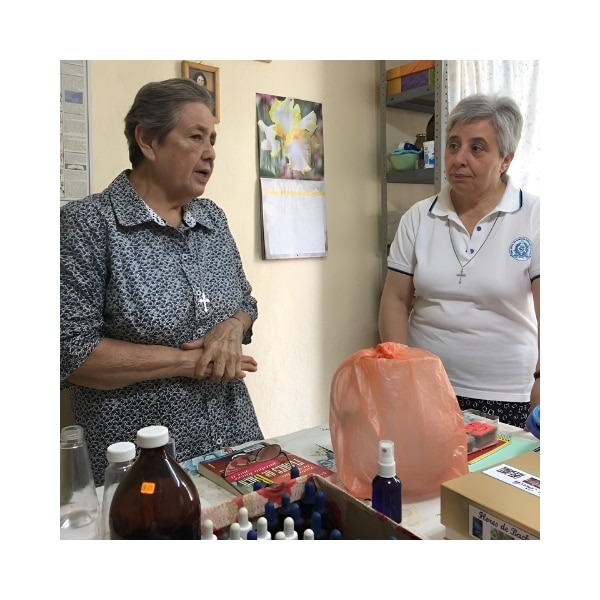 min_env_flowers_Maria C explains flower ministry to Emilia